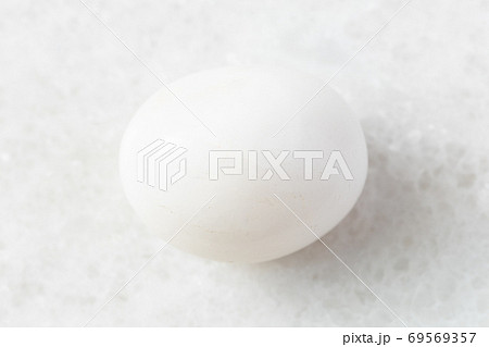 polished Milky Quartz rock on white marble 69569357