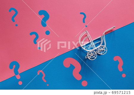 vintage baby stroller on a pink and blue background. Boy or girl question 69571215