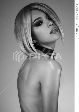 Asian woman with modern hairstyle. Asian woman with modern hairstyle. 69571624