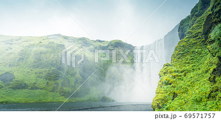 Skogarfoss waterfall and summer day, Iceland Skogarfoss waterfall and summer day, Iceland 69571757