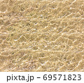 Seamless texture of clear water on sand background. Repeating pattern of waves with sun light reflections 69571823