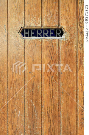 Texture of old wooden door, men toilet Texture of old wooden door, men toilet 69571825