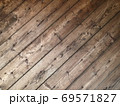 Diagonal texture of old wooden planks with rusty nails 69571827