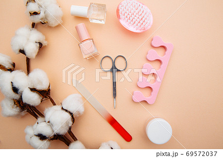 Professional steel manicure tools on pink table. Beauty care concept 69572037