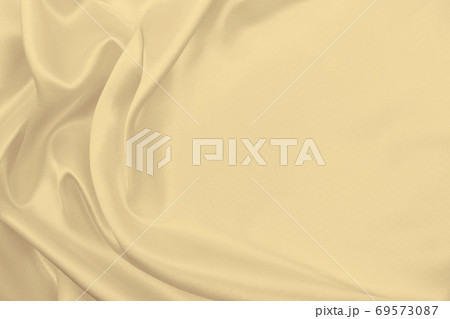 Smooth elegant golden silk or satin luxury cloth texture as wedding background. Luxurious background design. In Sepia toned. Retro style Smooth elegant golden silk or satin luxury cloth texture as wedding background. Luxurious background design. In Sepia toned. Retro style 69573087