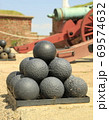 Stacked cannonballs 69574632