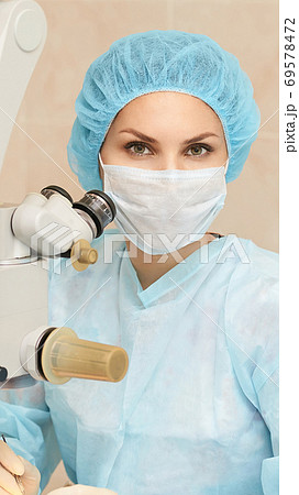 Ophthalmology laser microscope operation. Doctor clinic. Patient eye treatment 69578472