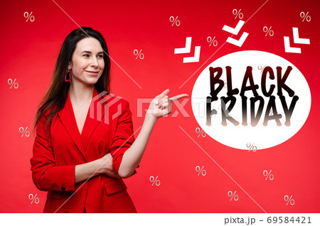 A portrait of a young girl points to a sign that 69584421
