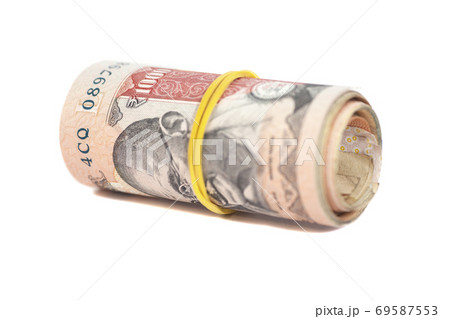 Roll of Indian rupees isolated on white 69587553