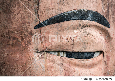 Close up of majestic Giant Leshan Buddha eye 69592079
