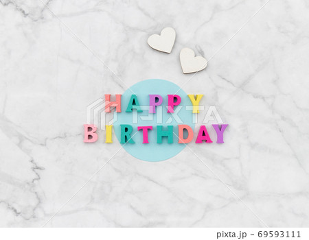 Happy birthday text from wooden colorful letters with hearts Happy birthday text from wooden colorful letters with hearts 69593111