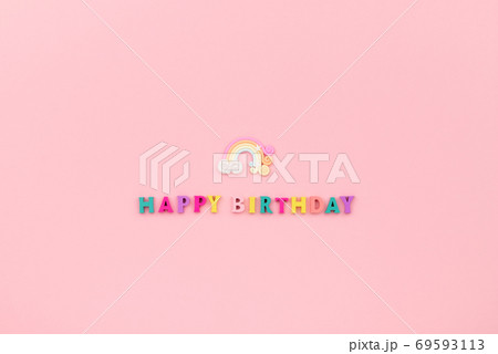 Happy birthday inscription from wooden colorful letters with rainbow Happy birthday inscription from wooden colorful letters with rainbow 69593113