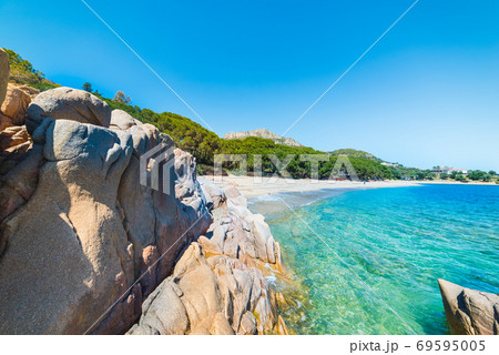 Rocks and sand in Santa Maria Navarrese beach Rocks and sand in Santa Maria Navarrese beach 69595005