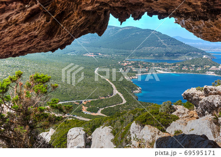 Capo Caccia coastline seen from a cave 69595171