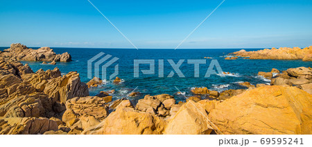 Clear sky over a rocky coast Clear sky over a rocky coast 69595241