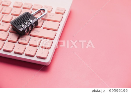 internet safety concept with padlocked on computer keyboard 69596196