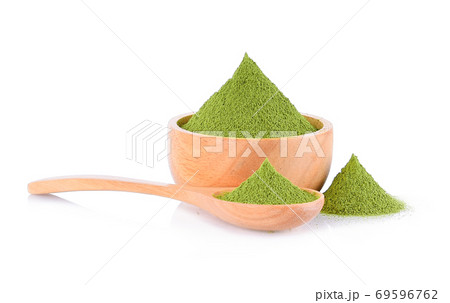 Green tea powder in bowl and in spoon on white background Green tea powder in bowl and in spoon on white background 69596762