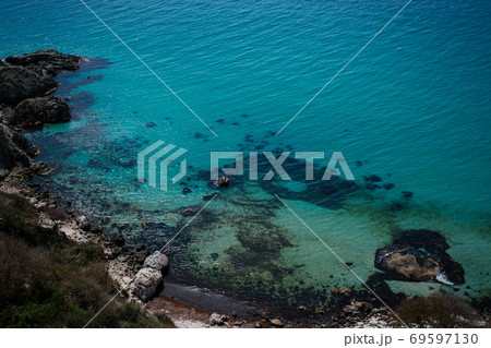 Beautiful view from the cliff on the blue sea. 69597130