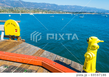 Yellow hydrant in Santa Barbara pier 69597186