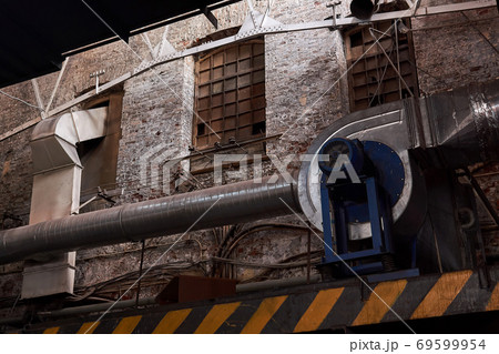 fragment of the interior of an old factory hall 69599954