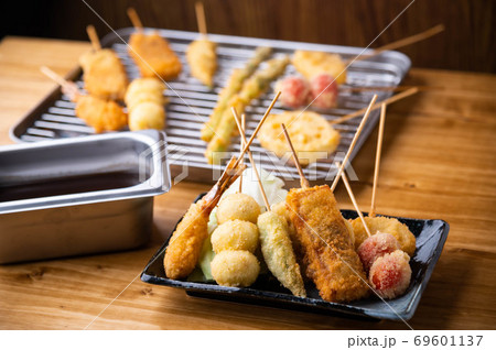 Kushikatsu or Kushiage, japanese Osaka style deep fried skewers 69601137