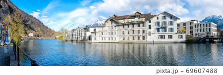 Panoramic view of Interlaken West downtown and Aare river 69607488