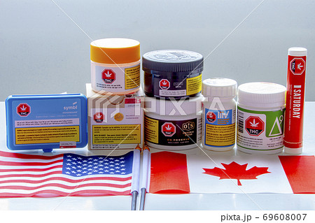 Calgary, Alberta, Canada. Sep 18, 2020. Canadian legal cannabis popular brands of marijuana weed with USA and Canada flag. Calgary, Alberta, Canada. Sep 18, 2020. Canadian legal cannabis popular brands of marijuana weed with USA and Canada flag. 69608007