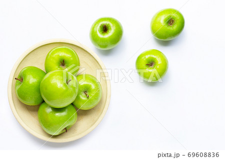 Green apples on white background. Copy space 69608836