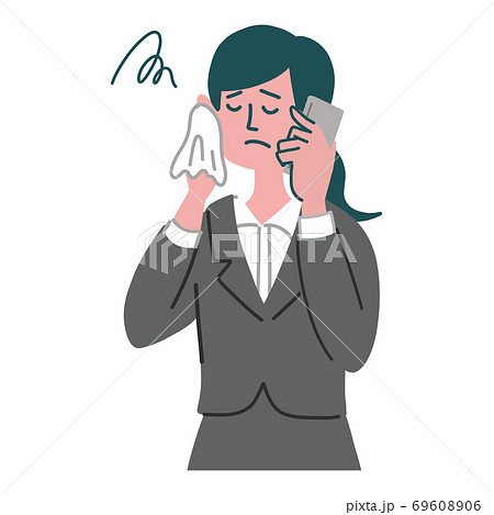 スーツ　女性　士業　携帯電話　スマホ　悩んでいる　冷や汗 69608906
