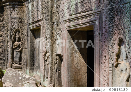Ta Prohm Temple is The One Attractive Temple In Angkor Thom Area at Siem Reap Province of Cambodia. Ta Prohm Temple is The One Attractive Temple In Angkor Thom Area at Siem Reap Province of Cambodia. 69618189