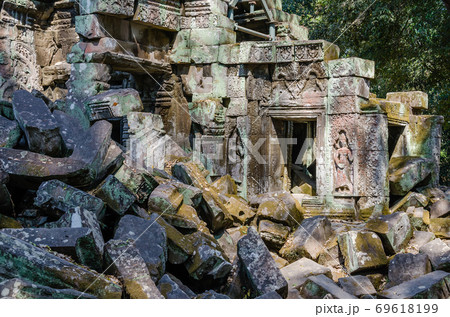 Ta Prohm Temple is The One Attractive Temple In Angkor Thom Area at Siem Reap Province of Cambodia. Ta Prohm Temple is The One Attractive Temple In Angkor Thom Area at Siem Reap Province of Cambodia. 69618199