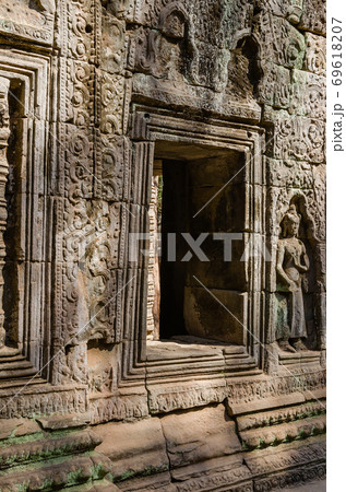 Ta Prohm Temple is The One Attractive Temple In Angkor Thom Area at Siem Reap Province of Cambodia. Ta Prohm Temple is The One Attractive Temple In Angkor Thom Area at Siem Reap Province of Cambodia. 69618207