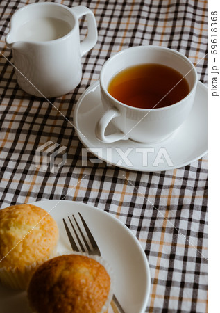 Cup of Tea and Milk with Cupcake for the Time of Tea Break. 69618368