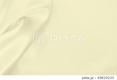 Smooth elegant golden silk or satin luxury cloth texture as wedding background. Luxurious background design. In Sepia toned. Retro style Smooth elegant golden silk or satin luxury cloth texture as wedding background. Luxurious background design. In Sepia toned. Retro style 69620235