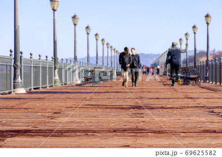 View  of historic wooden Pier 7. Famous San Francisco promenade. California, USA 69625582