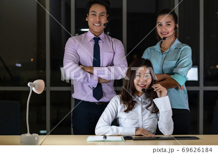 Call center team Portrait at night Call center team Portrait at night 69626184