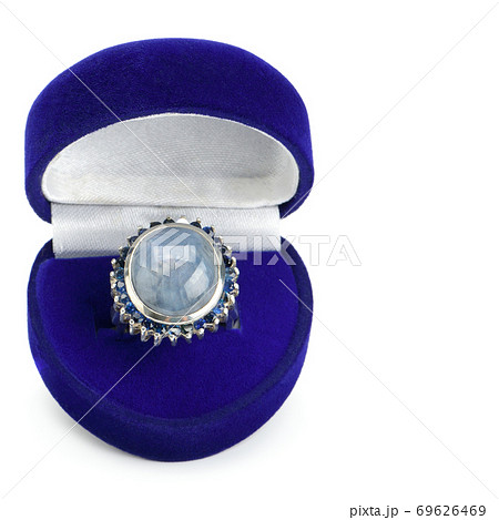 Ring with natural sapphires isolated on white background. Gems of Sri Lanka. Free space for text. 69626469