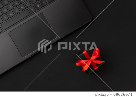 Creative flat lay top view composition laptop and gift 69626971