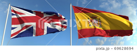 Flying flags of Great Britain and Spain on sky background, 3d rendering Flying flags of Great Britain and Spain on sky background, 3d rendering 69628694