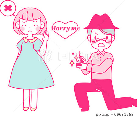 指輪を出してプロポーズをするカップル 69631568