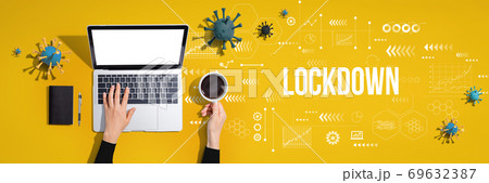 Lockdown theme with person using laptop computer Lockdown theme with person using laptop computer 69632387