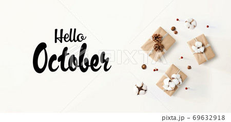 Hello October message with gift boxes with cottons Hello October message with gift boxes with cottons 69632918