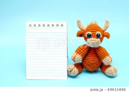 The bull is the symbol of the New year 2021. Happy New year. 69633896