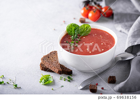 tomato puree soup with spinach tomato puree soup with spinach 69638156
