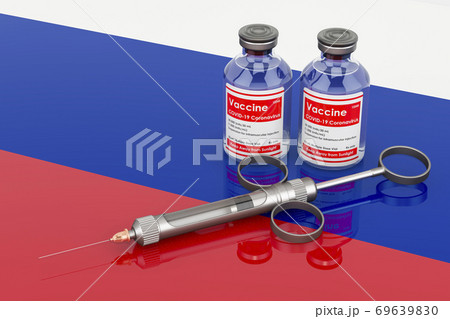 Vaccination in Russia concept. Vaccine bottles with syringe on the Russian flag, 3D rendering 69639830