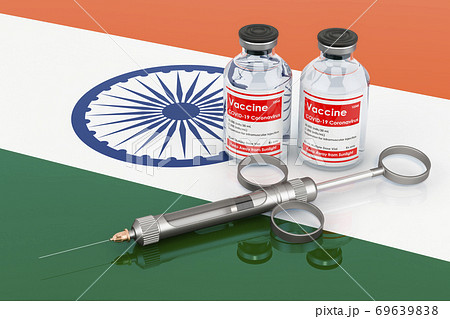 Vaccination in India concept. Vaccine bottles with syringe on the Indian flag, 3D rendering 69639838