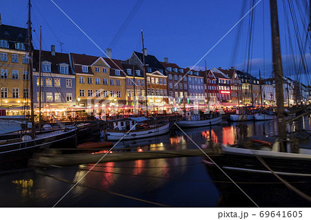 Nyhavn water front canal and touristic street at Copenhagen 69641605