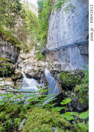 The shwangau waterfalls and the Neuschwanstein The shwangau waterfalls and the Neuschwanstein 69641613