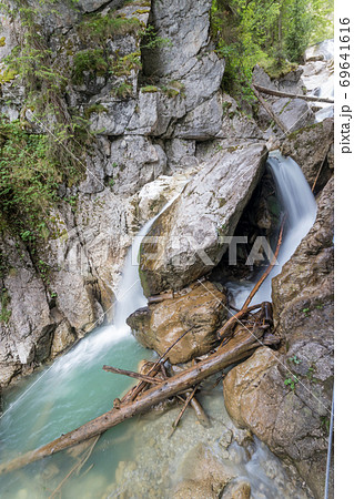 The shwangau waterfalls and the Neuschwanstein The shwangau waterfalls and the Neuschwanstein 69641616