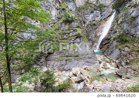 The shwangau waterfalls and the Neuschwanstein The shwangau waterfalls and the Neuschwanstein 69641620